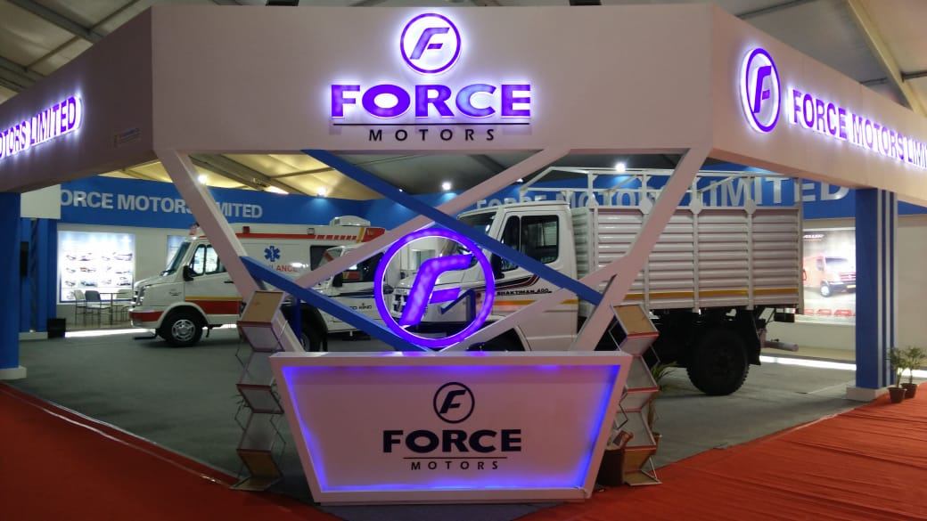 Force Motors exhibition stand with illuminated canopy and vehicle display